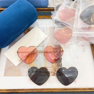 Gafas de sol de corazón de diseñador para mujer, gafas de sol con montura de Metal, gafas de sol de calle para exteriores, accesorios de playa