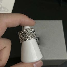Designer de alta qualidade Imperatriz Viúva escavada cheia de diamante Saturno anel feminino nicho design high-end sentimento luz luxo anel personalizado anel de abertura