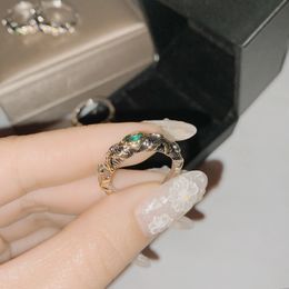 Designer Italie Buccella Blue Treasure Couple d'anneau de trésor tissé Micro-ininset Micro-ininset Emerald Zircon Ring Male et Femme Gift Party sans boîte sans boîte