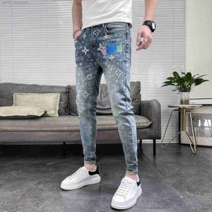 Jeans de créateurs pour hommes 2024 printemps / été nouvelle tendance de mode Pumpkin imprimé jeans marque de mode masculine Slim Fit Small Foot Long Pantalon Fashion Pantalon