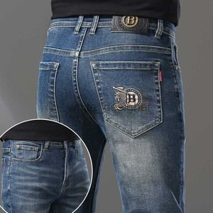 Jeans de créateurs pour hommes automne hiver nouveau jeans pour hommes de qualité de la qualité européenne ajusté petit pied brodé pantalon de mode