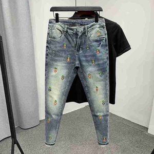 Designer Jeans pour la marque masculine Brand de mode jaune canard brodé jean slim fit d'automne nouveau pantalon de pieds décontracté pour garçons