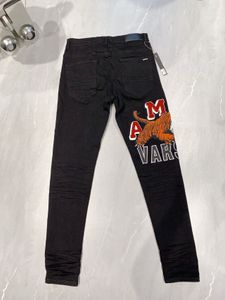 Jeans de créateurs pour hommes jeans de haute qualité mens de mode masculine cool style de luxe pantalon en détresse biker noir jean slim slim fit