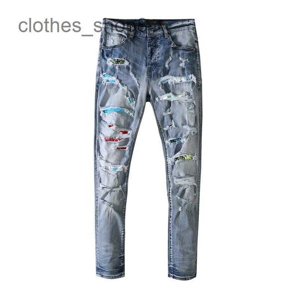 Jeans de diseñador Jean Amirres Denim Pantalones para hombre OFF nuevo parche de color de la calle principal hecho viejo agujero arco iris dañado etiqueta de moda 98LZ