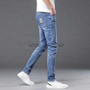 Designer jeans heren lente/zomer nieuw modemerk geborduurde jeans heren slanke fit elastische kleine voet lange broek 985