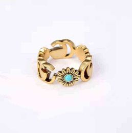bijoux de créateur bracelet collier accessoires de haute qualité bague marguerite fleur de bronze bague turquoise pour les couples