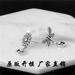 bijoux de créateur bracelet collier bague Antique Daisy incrusté asymétrique personnalisé ins Boucles d'oreilles couple paire de boucles d'oreilles