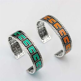 designer sieraden armband ketting ring vierkant breed oranje groen emaille paar armband