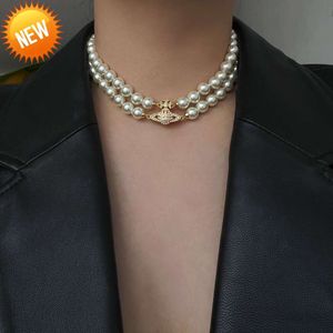 Bracelet de bijoux de créateurFermoir magnétique Collier de perles Saturne double couche ras de cou version haute chaîne de clavicule accessoire haut de gamme