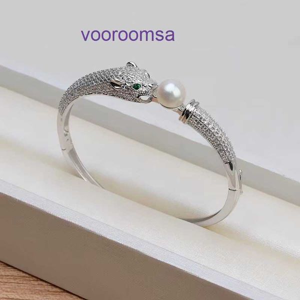 Joyería de diseño Neumáticos de automóvil Pulseras Pulsera con ojos verdes llenos de diamantes Leopardo dominante Apertura con micro incrustaciones de gama alta Perla DIY con caja original