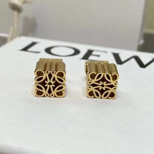 Boucles à charme de bijoux de créateur bouton d'oreilles