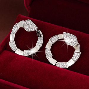 Charme de bijoux de créateur Design personnalisé et à la mode avec cuivre incrusté zircon en forme de serpent pour femmes boucle oreille de la Saint-Valentin