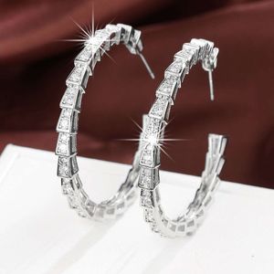 Bijoux de créateur Charme tendance style géométrique en cuivre semi-circulaire incrusté zircon personnalité atmosphérique boucles d'oreilles féminines