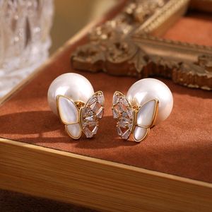 Bijoux de créateurs Bouilles d'oreille Tempilement papillon incurvé de couleur perle perle haut de gamme haut de gamme de boucles d'oreilles polyvalentes légères poteaux d'oreilles femmes