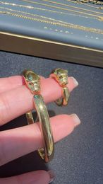 Дизайнерские украшения Золотой браслет Ювелирные изделия клана Ван Полное золото 999 Леопард Зеркало Лицо Жареная эмаль Подарки для пары в одном стиле XXKXQ