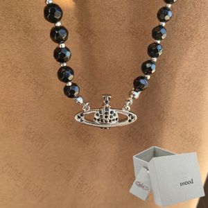 Collar de joyería de diseñador Cristal negro de un solo collar de diamante completo Punk Collar de viento oscuro para hombres y mujeres246o