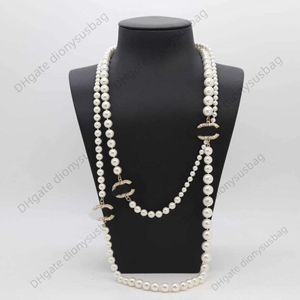 Collier de bijoux de créateurs Centenaire Commémorative Petite Perle Double Couche Femme Street Shooting Tempérament Chemise Chandail Chaîne