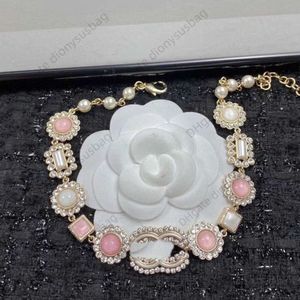 Collier de bijoux de créateur nouveau tempérament élégant petit diamant de tournesol rose suspendu Double chaîne de cou vent de luxe qualité