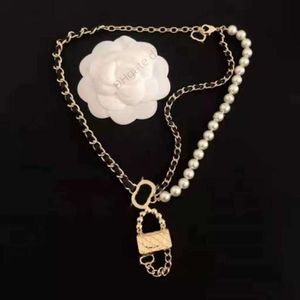 Collier de bijoux de créateurs Vent Polyvalent Perle À La Main En Cuir Noir Tissé Double Sac Pendentif Sexy Senior Celebrity Collier Collier Chaîne