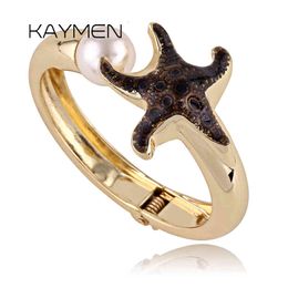 Bijoux de créateurs Date Unique Desgin Starfish Forme Incrustée Imitation Perle Bracelet Manchette Bracelet pour Fille Plaqué Or Top Qualité
