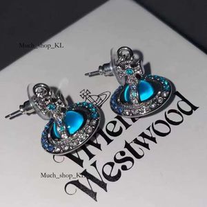 Boucles d'oreilles de la créatrice Viviane Westwood
