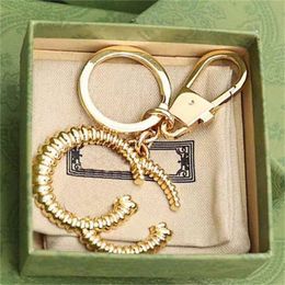 Diseñador Key Hebilla Fashion Bag Keychain Decoración Hombres Mujeres Cadena de llave de automóvil Costilización de moda de alta calidad con caja