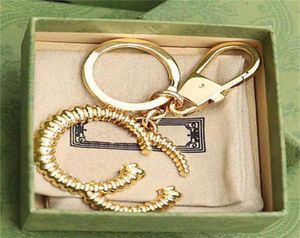 Diseñador Key Hebla Fashion Bag Keychain Decoración Hombres Mujeres Cadena de llave Costilla de moda de alta calidad con Box8650393