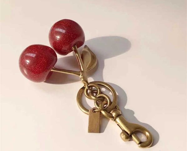 Porte-clés de styliste Style cerise, rouge à lèvres rouge à lèvres, couverture d'équipe, Cozybag, partie Mode Mode