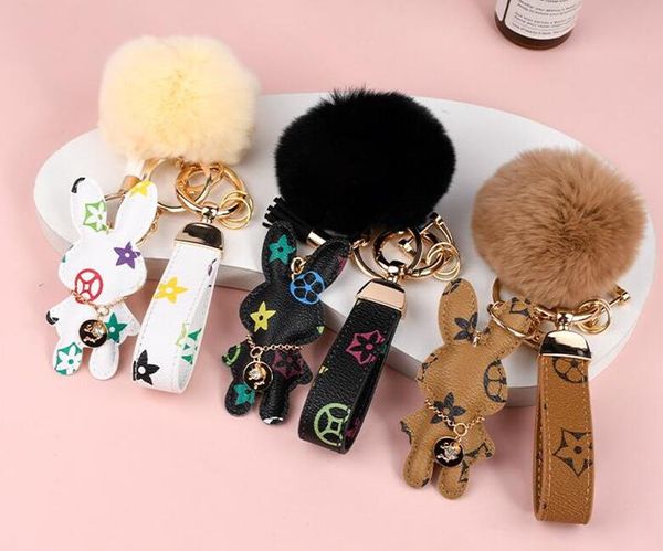 Designer porte-clés en cuir de lapin boule de fourrure charme porte-clés voiture pendentif en métal personnalité de la mode couple créatif damier variété de styles Pendentifs Charmes