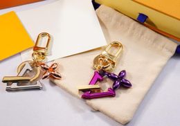 Designer Keychain Women V Letters Designers Keychain portefeuille Top Llavero Car Key Chain Men Boucle Bijoux Fleur Keychains Couches avec boîte avec boîte