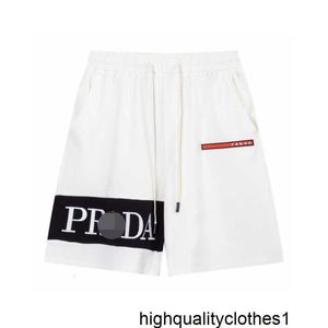 Diseñador de pantalones cortos correctos de punto para hombres Verano Nueva marca de moda Pi Shuai Empalmado Bordado Deportes Pierna recta suelta Casual 5 puntos JZX9