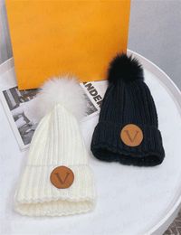 Designer de malha chapéu gorro fuzzy bolas chapéus fax pele cabelo marca moda para homem mulher inverno quente boné 6 cores qualidade superior 8177444