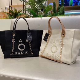 Designer Sacs de plage de grande capacité Luxury Perle Tote Seaside Ladies Sac à main Sac à vaisselle Sacs à main Duffel Sac à main portefeuille CH1022