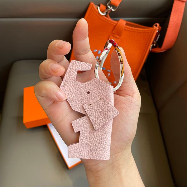 colgante de elefante de cuero de diseñador Piezas del bolso patrón de lichi adorno de cuero de vaca llavero de coche bolsos decoración hecha por 100% cuero de vaca Accesorios HBP