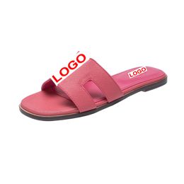Sandalias de damas de cuero diseñador 2024-1 zapatos planos de verano Fashion Beach Women Slippers Letter arrastre
