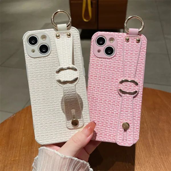 Funda de teléfono de cuero de diseñador para iPhone 14 Pro Max 13 12 11 X Xsmax Correa de muñeca de moda Fundas de teléfonos tejidos Funda suave rosa CYG239228-6