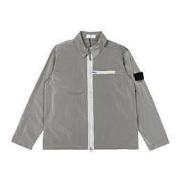 Chemises de veste de foudre de concepteur Topstoney Printemps Automne Couple Résistant à l'eau Manteau de peau en nylon crème solaire fonctionnelle Vestes pour hommes ST0NE-23829