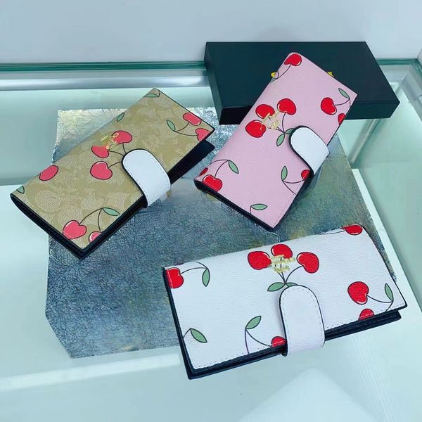 Diseñador Cartera larga Cach Bolso de diseñador Lujo para mujer Nueva billetera con tarjeta triple plegable Moda impresa Versátil con bolso de cambio de ranura