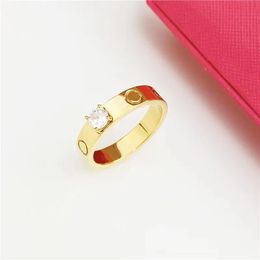 Anillo de amor de diseñador Anillo de acero de titanio de diseñador de alta calidad Joyería de moda Hombres Mujeres Anillos de compromiso de boda Regalo de aniversario