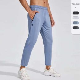 Designer Lu Mens Jogger lange broek Sport Yoga Outfit Quick Dry Drawring Gym Pockets Heatpants broek Broek Casual Elastic Taille Fitness 5566ess