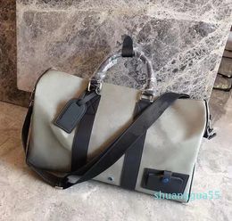 Designer-Luggage Travel Bag Titanium Legering 47 cm Duffel Handtassen Portores Mannen Duffle Backpacks Tote handtas