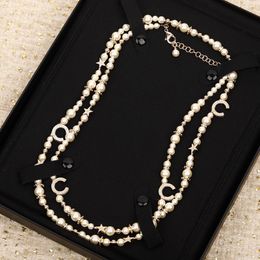 Collier classique de luxe de luxe pour femmes, chaîne de pull en perles blanches, étoile à cinq branches, en forme de O, en laiton, bijoux de charme, cadeau surprise pour mère