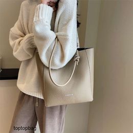 Diseñador de moda de lujo Bolsas cruzadas de moda Moda Nueva Bolsa de cubo simple 2024 Gran capacidad Versátil Un hombro Madre Tote Bolsa para mujer