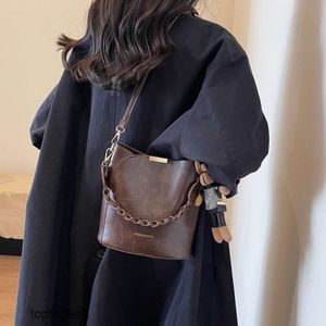 Designer Luxury Fashion Cross Body BagsSac seau à la mode 2023 nouveau sac à bandoulière à bandoulière à la mode et polyvalent pour femmes