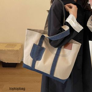 Designer Sacs de soirée de mode de luxe Loisirs coréens Grande capacité Sac fourre-tout minimaliste Style artistique Tempérament polyvalent pour les étudiantes féminines One Shoul