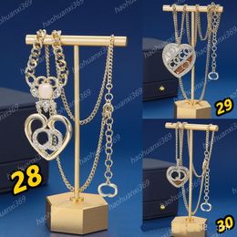 Collier de mode de luxe de créateur Chaîne de tour de cou 18k colliers en acier inoxydable plaqué en or pour femmes bijoux Micro Inclays en forme de cœur