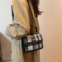 Designer Luxe mode schoudertassen Nieuwe kleine vierkante tas 2023 Britse stijl handtas Eén schouder Crossbody stijl Tofu tas