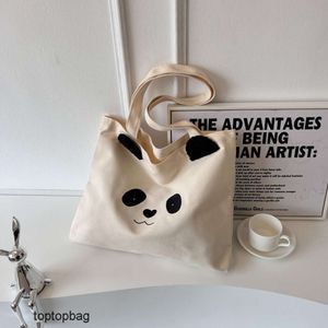 Designer Sacs fourre-tout de mode de luxe Version coréenne du sac en toile de panda artistique et décontracté 2023 nouveau sac à bandoulière à la mode et minimaliste