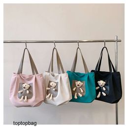 Designer Sacs fourre-tout de mode de luxe Portefeuilles À la mode et minimaliste femme étudiante douce et mignonne toile ours sac fourre-tout polyvalent quotidien unique épaule com