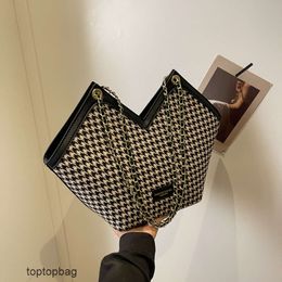 Diseñador Bolsas de asas de moda de lujo Carteras Bolso para mujer 2023 Nuevo Xiaoxiang Lady Fan Qianniao Grid Bolso de mano versátil Bolso de cadena de un solo hombro Bolso para mujer